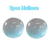 Two translucent light blue maltose spheres used as a squishy stress relief toy
