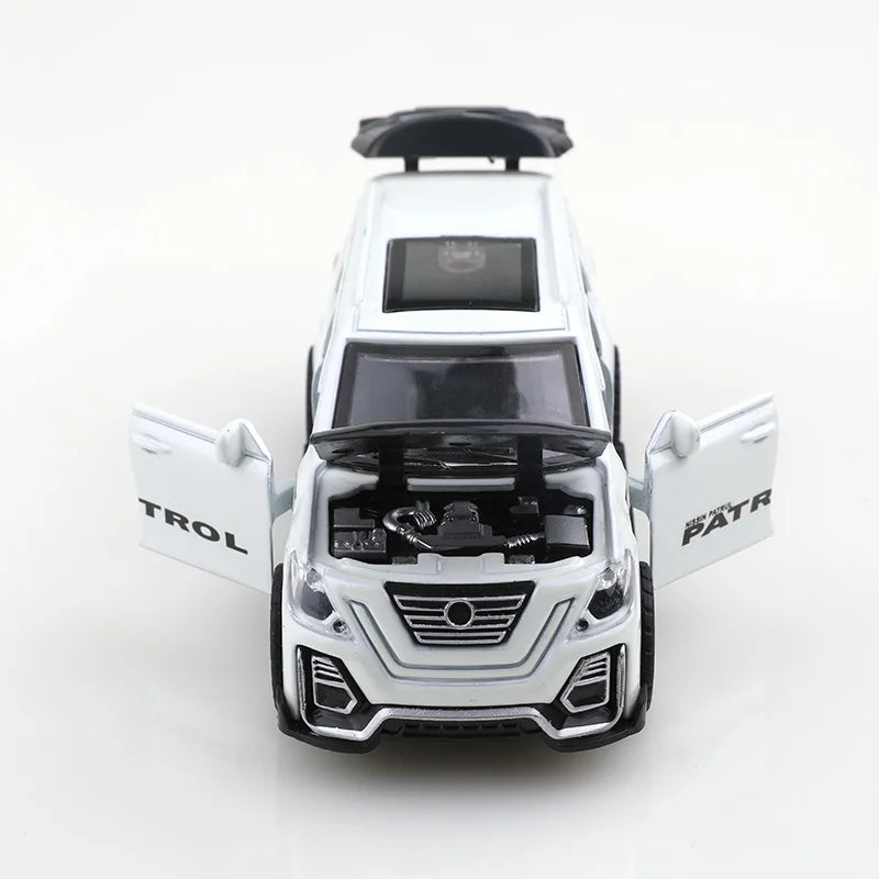 A white 1:36 scale die-cast metal SUV toy with opening doors and pull-back action.
