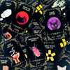 A collection of black oracle cards featuring mystical symbols and illustrations for divination.