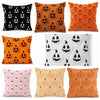 A set of colorful decorative cushion covers featuring Halloween pumpkin and ghost patterns.