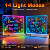 Two illuminated LED light modes display colorful graphics on a wooden surface.