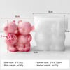 A pink silicone mold of a bear is shown next to its finished product, illustrating the size difference for DIY crafts.