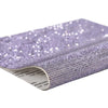 Roll of purple sparkling rhinestone adhesive tape for DIY crafts and decor