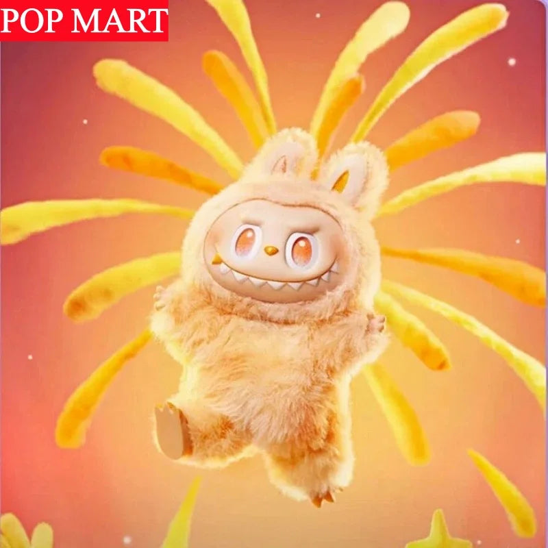 A fluffy, light brown plush doll resembling a creature with large ears and teeth, set against an orange background.
