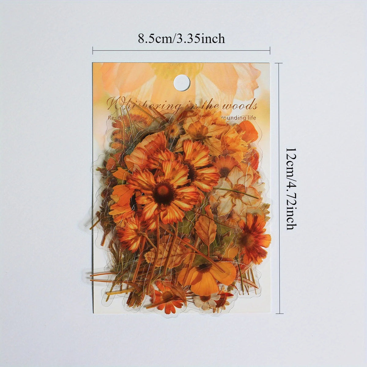 A sheet of transparent floral stickers featuring orange and yellow flowers and greenery for journals and crafts.
