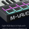 Close-up of an M-VAVE MIDI keyboard controller showing eight RGB backlit pads.