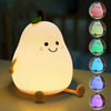 A white pear-shaped night light with a smiling face and multiple color options displayed in a circle.