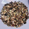 Assorted metal pendants and charms in gold and black for jewelry making
