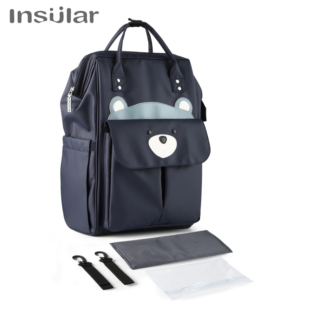 A navy blue waterproof diaper backpack with a removable changing mat and stroller straps.