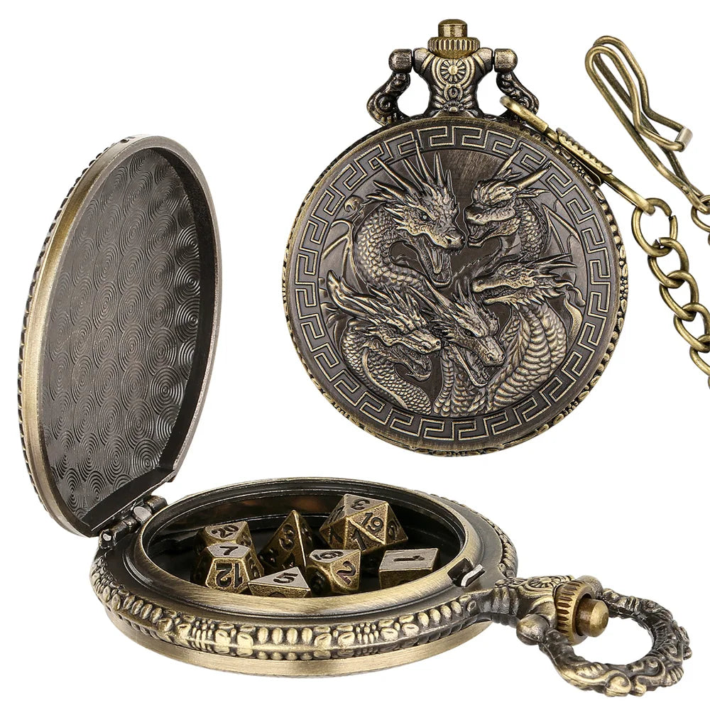 A brass steampunk dragon pocket watch dice case with an open lid and a separate decorative top.