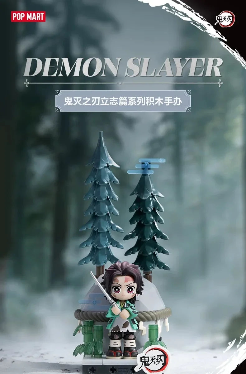 Demon Slayer collectible blind box figures featuring a character in traditional attire and a sword amidst a snowy forest back