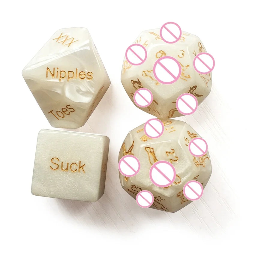 Three ivory dice showing various body parts like nipples, toes, and suck, with crossed-out symbols.