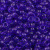 A close-up view of small, translucent purple pony beads for jewelry making and craft projects.