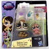 A packaged set of three or five small animal figures, including a girl and various cute creatures.