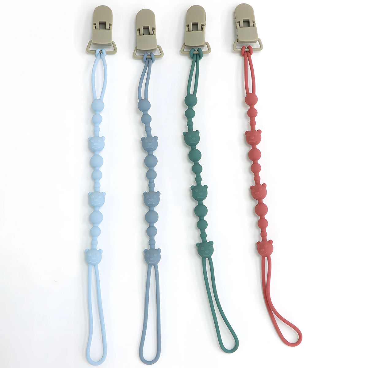 Four silicone anti-loss pacifier clips in light blue, gray, green, and red.