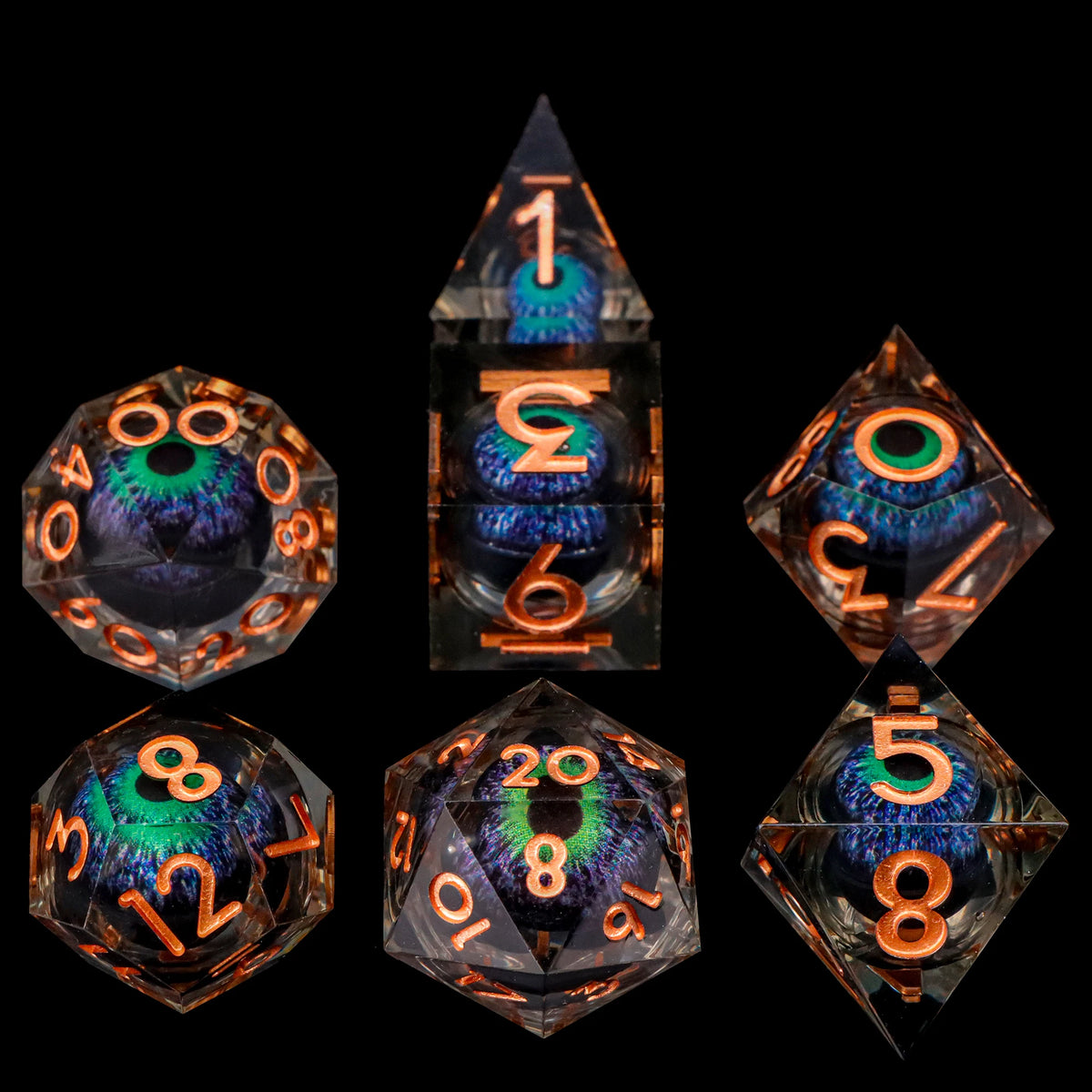 A collection of seven sharp edge resin dice shaped like dragon eyes, featuring various numbers and symbols.