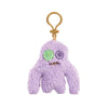 A purple plush monster keychain with a rabbit design and a gold-colored loop.