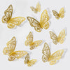 A collection of rose gold 3D butterfly wall stickers in various sizes and orientations.