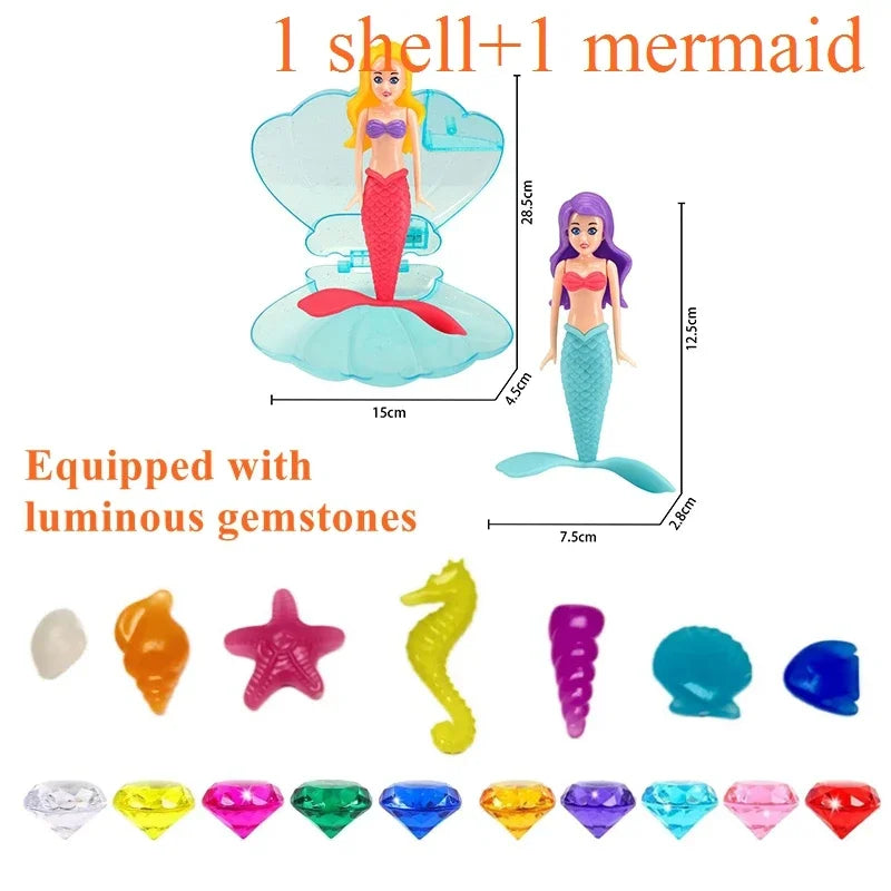 A mermaid dive toy featuring a shell and a mermaid figure equipped with luminous gemstones.