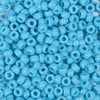 A pile of small, round, light blue pony beads for jewelry making and craft projects.