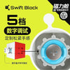 A close-up of a Swift Block magnetic cube being used for a number test on a device.