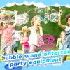 Children playing outdoors with giant bubble wands and bubble equipment for a party
