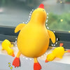 A bright yellow squishy duck fidget toy with orange feet is shown against a light background.