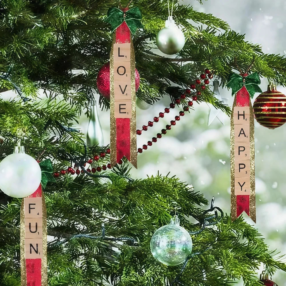 Christmas tree decorated with wooden alphabet letter tiles spelling LOVE HAPPY FUN