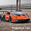 Orange 1:24 Lamborghini Essenza SCV12 diecast model car parked outdoors with a blurred background.