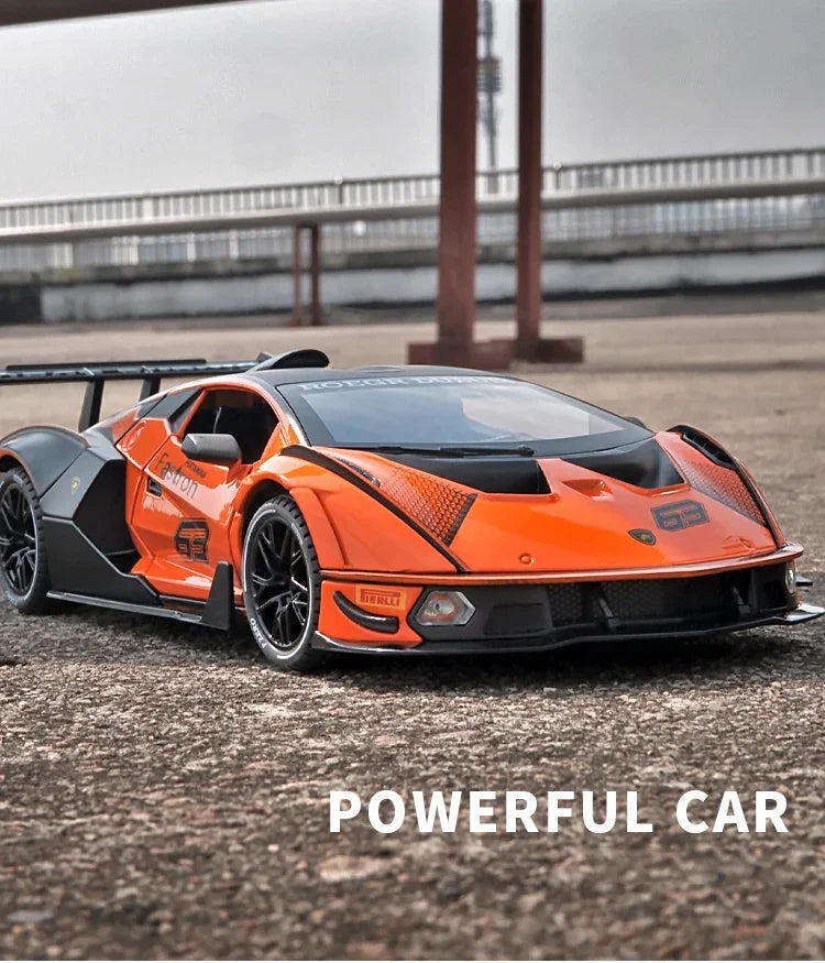 Orange 1:24 Lamborghini Essenza SCV12 diecast model car parked outdoors with a blurred background.