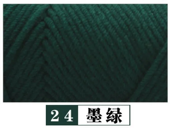 A close-up view of dark green yarn, labeled as number 24, silk yarn.