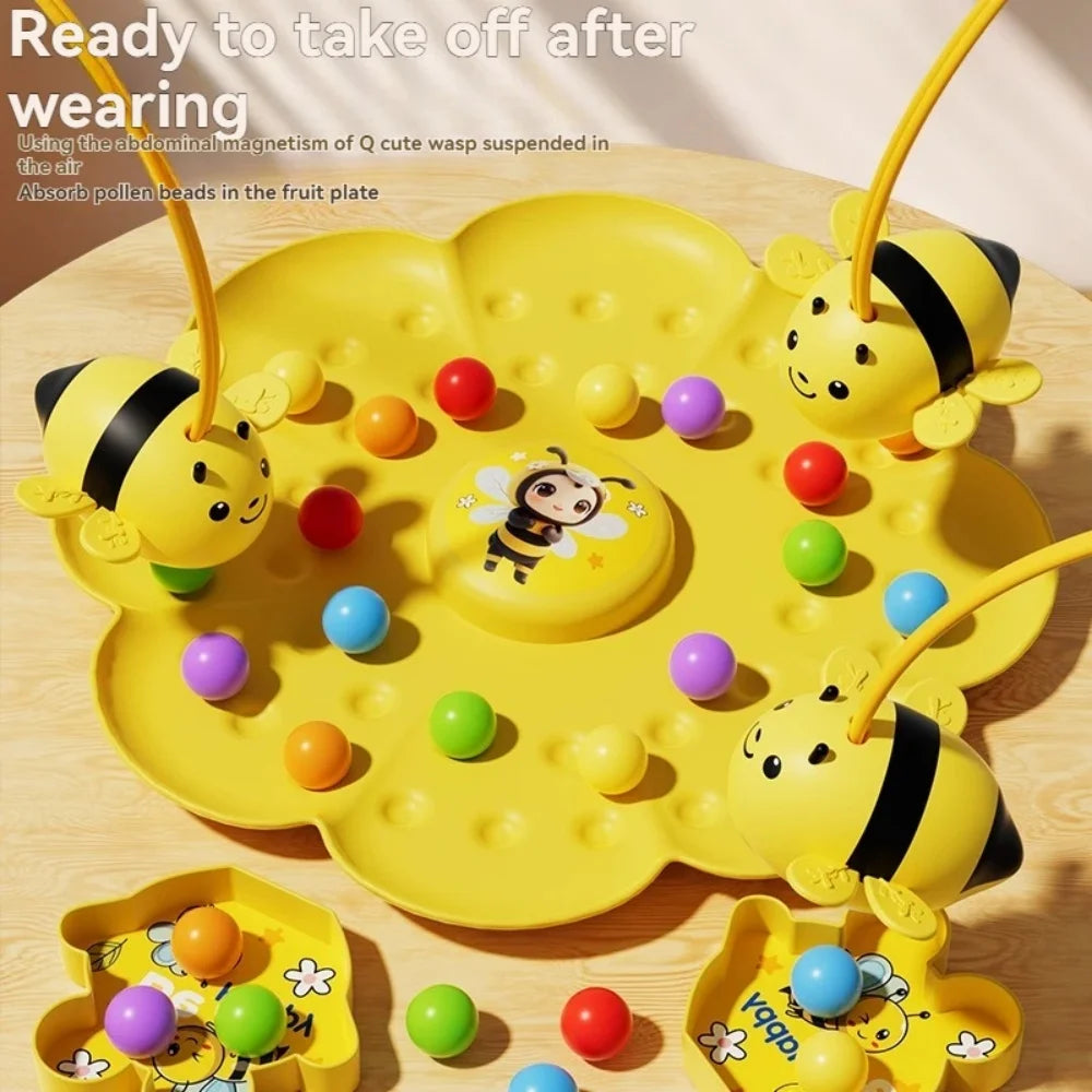 A yellow board game featuring a bumblebee theme with colorful balls and bee figures.