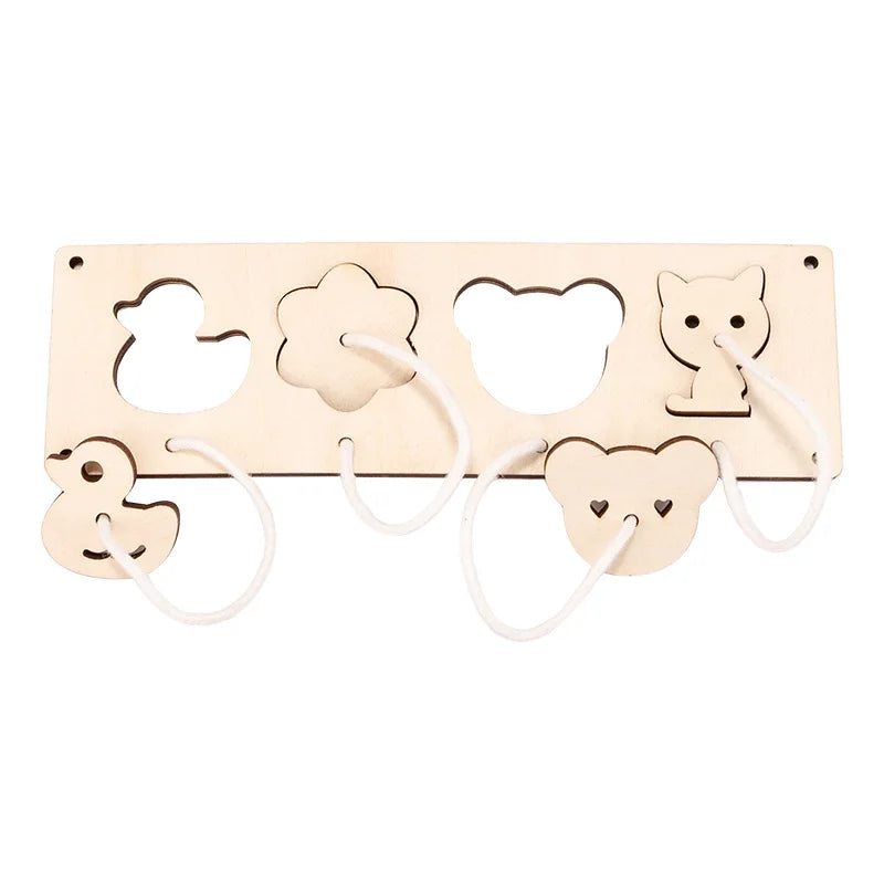 A light wood Montessori busy board with various cutout shapes for sensory learning and fine motor skills.