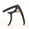 Black universal guitar capo with a metal tuning mechanism