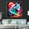 A vibrant diamond painting kit featuring a wolf howling against a glowing red moon and cosmic background.