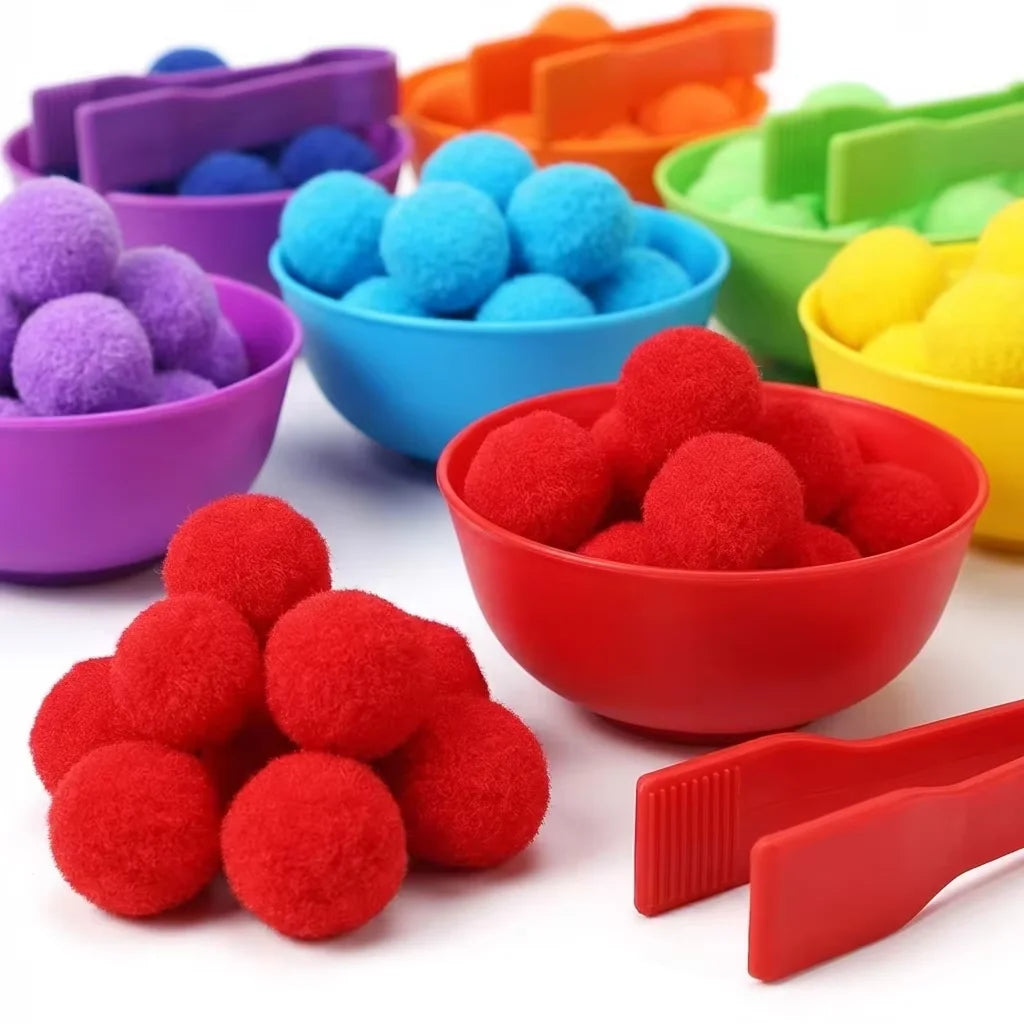 A colorful set of foam balls and red tweezers used for sorting and counting toys.