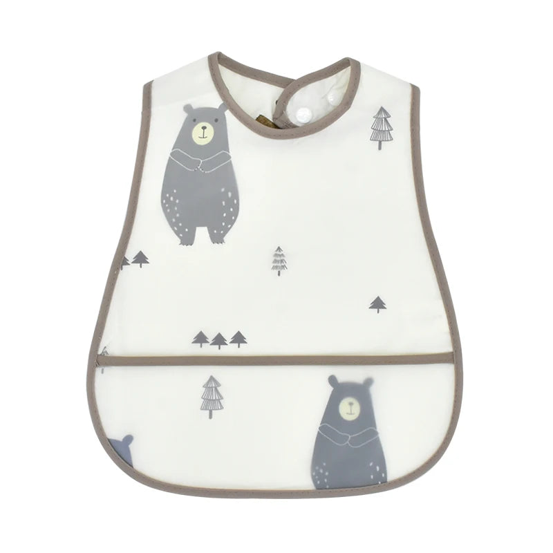 A white baby bib with a gray bear pattern and a brown trim.