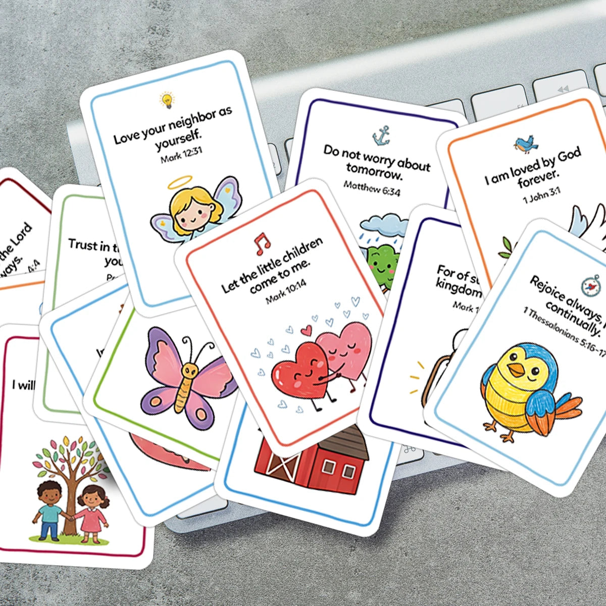 A collection of illustrated Bible prayer cards for kids featuring verses like Love your neighbor and I am loved by God