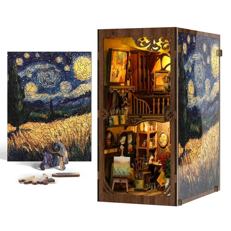 A wooden book nook kit featuring a detailed miniature scene with figurines and a starry landscape.