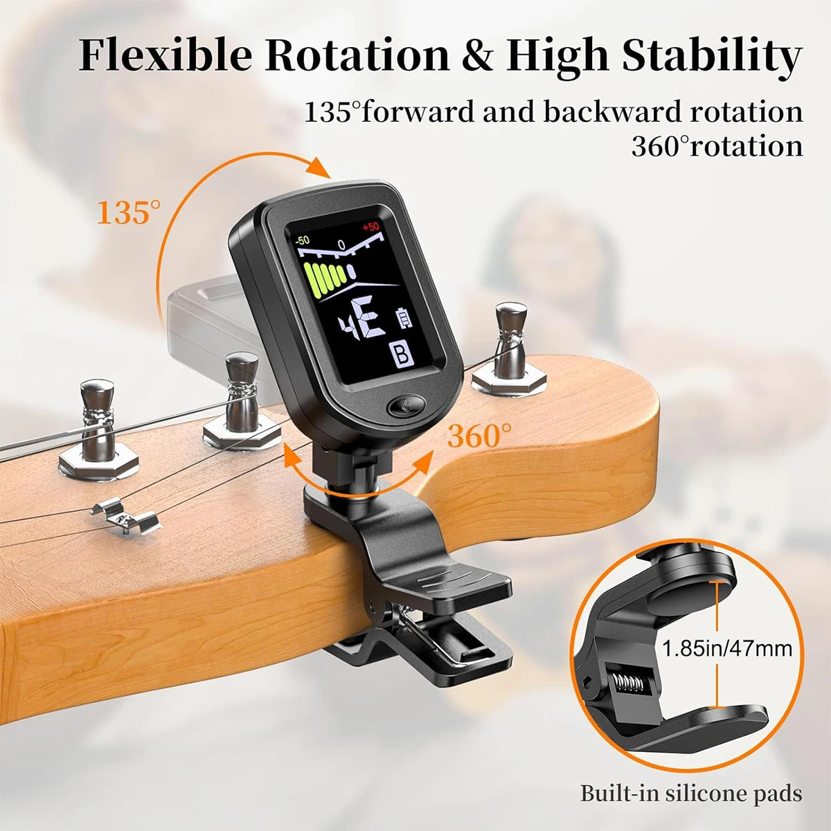A black clip-on tuner with a color display is shown mounted on a wooden surface, demonstrating flexible rotation and stabilit