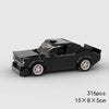 A black classic rally car model built from building blocks.