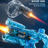 A close-up of a blue LED electric water gun with a circular grip and firing mechanism against a dark background.