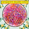 Eine farbenfrohe Auswahl transparenter Doppelfarben für DIY-Gummiloomarmbänder.