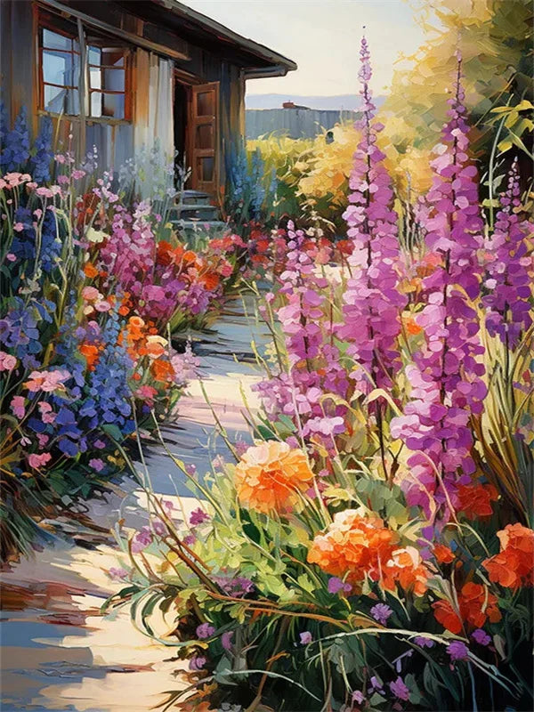 A vibrant garden scene featuring purple and pink lavender flowers lining a stone path next to a wooden building.