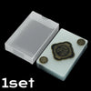 A set of waterproof transparent playing cards displayed in a white holder with gold-edged cards.