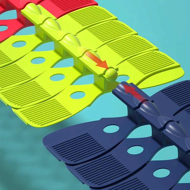 A set of flexible anti-gravity race car tracks in red, yellow, and blue plastic.