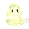 A translucent yellow acrylic ghost bead with black eyes and pink accents.
