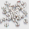 A collection of silver crystal rondelle spacer beads for jewelry making, displayed on a white background.
