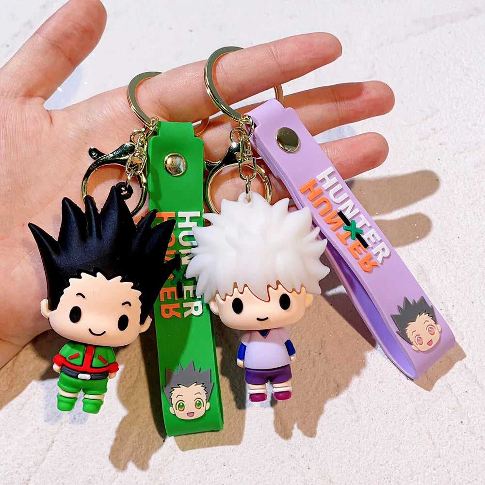 Hunter x Hunter anime character resin keychain featuring a black-haired character and a white-haired character