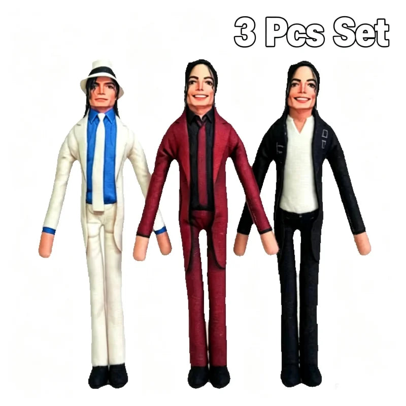 A set of three collectible plush dolls resembling Michael Jackson with movable joints.